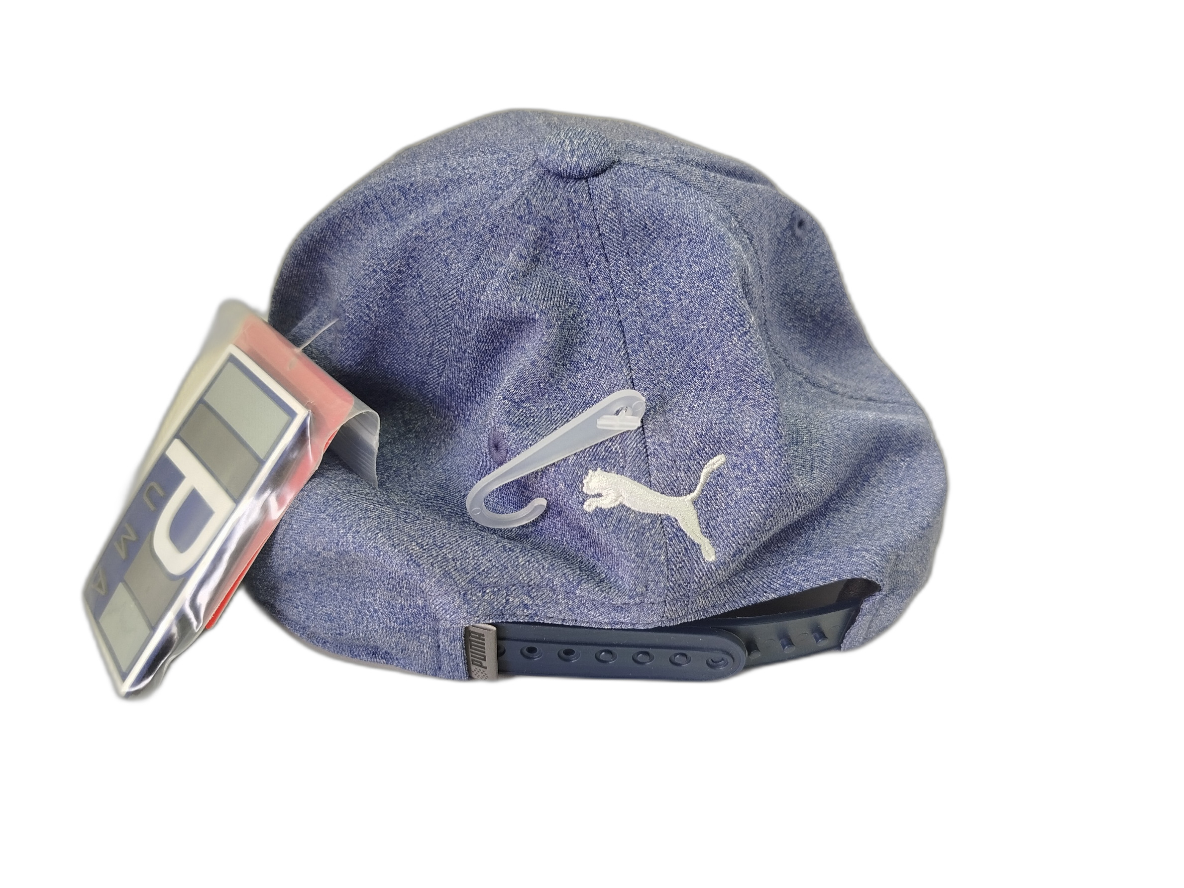 Gorra PUMA Gof Utility Patch 110 Snapback en color azul melange. Incluye parches intercambiables. Teconología Flexfit 110 para ajuste cómodo y ajustable