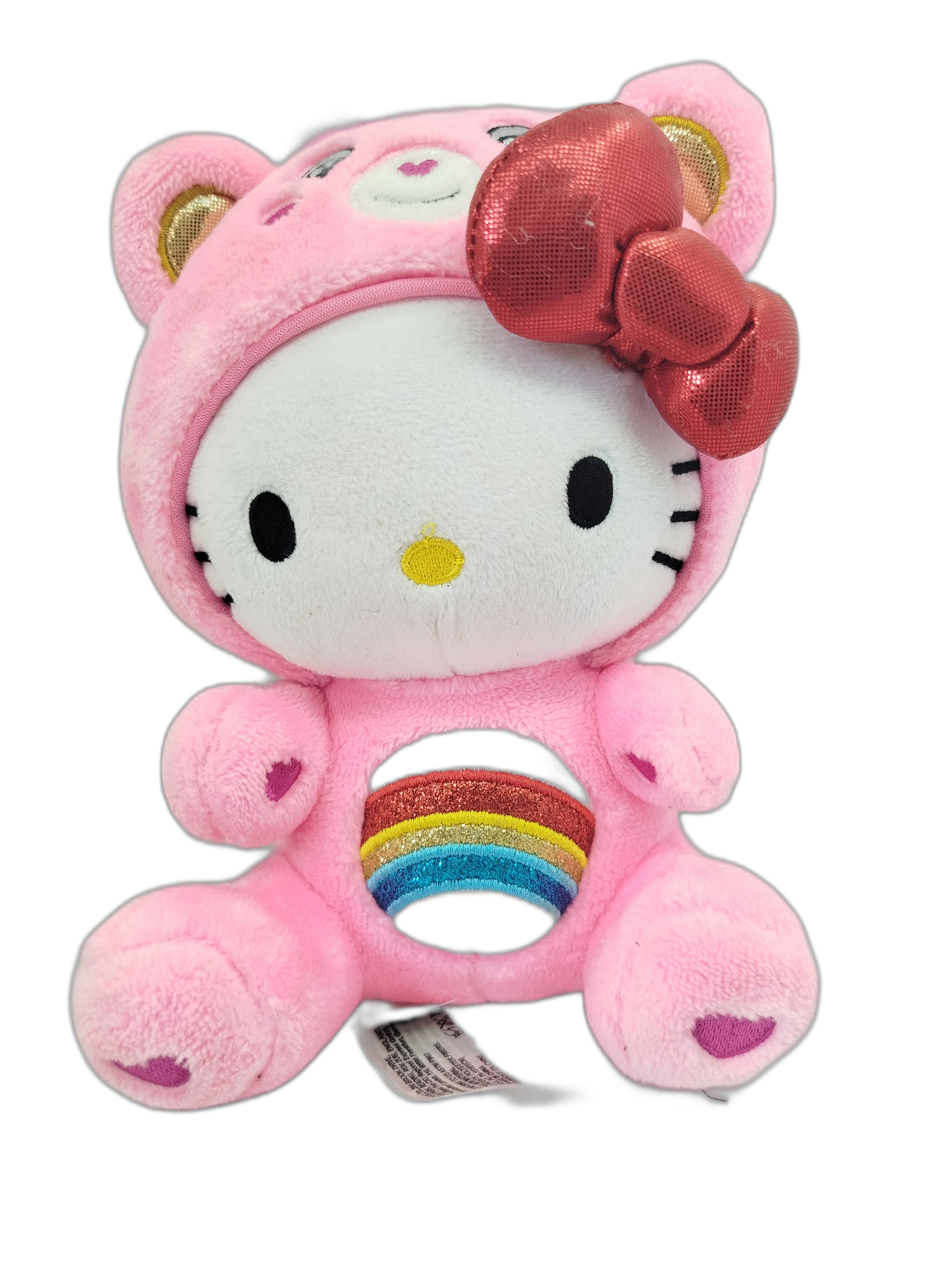 Hello Kitty con  lazo rojo brillante y el clásico arcoíris multicolor bordado en el pecho.