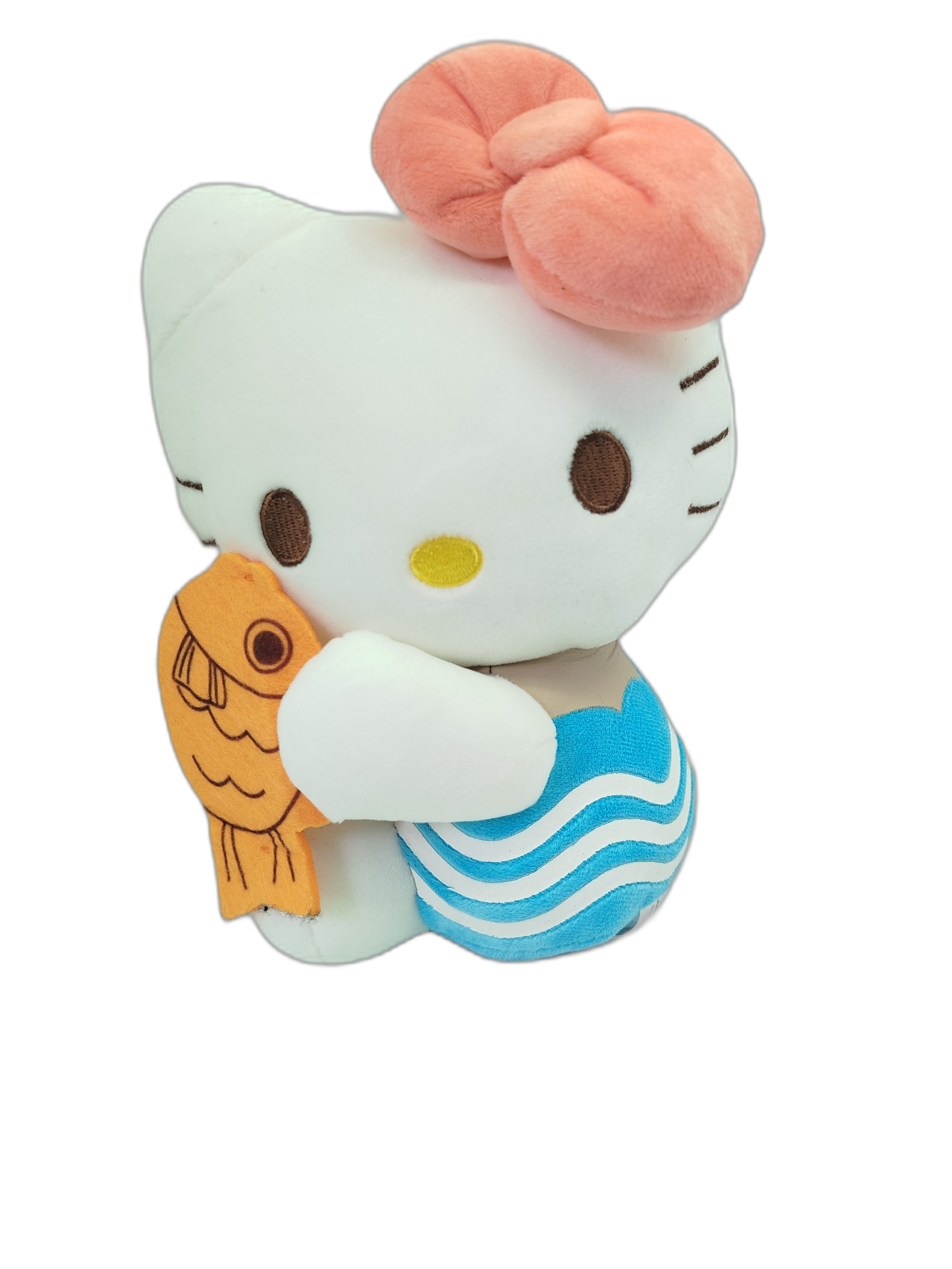 Hello Kitty sosteniendo un pez Taiyaki (el tradicional pastel japonés en forma de pez).
