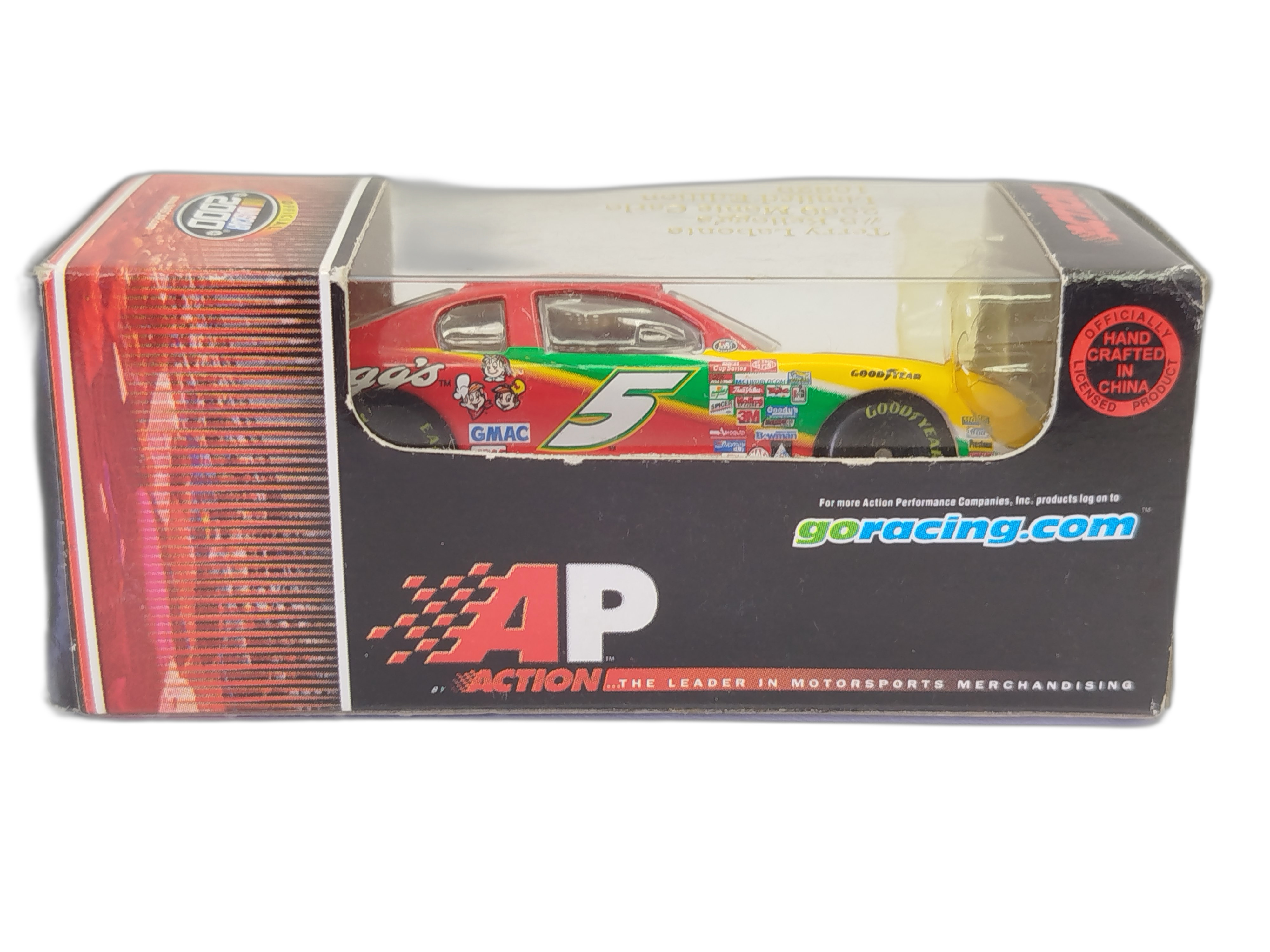 Carro a escala de colección de la NASCAR del piloto Terry Labonte, modelo Chevrolet Monte Carlo del año 2000 patrocinado por Kellogg's y fabricado por la marca Action