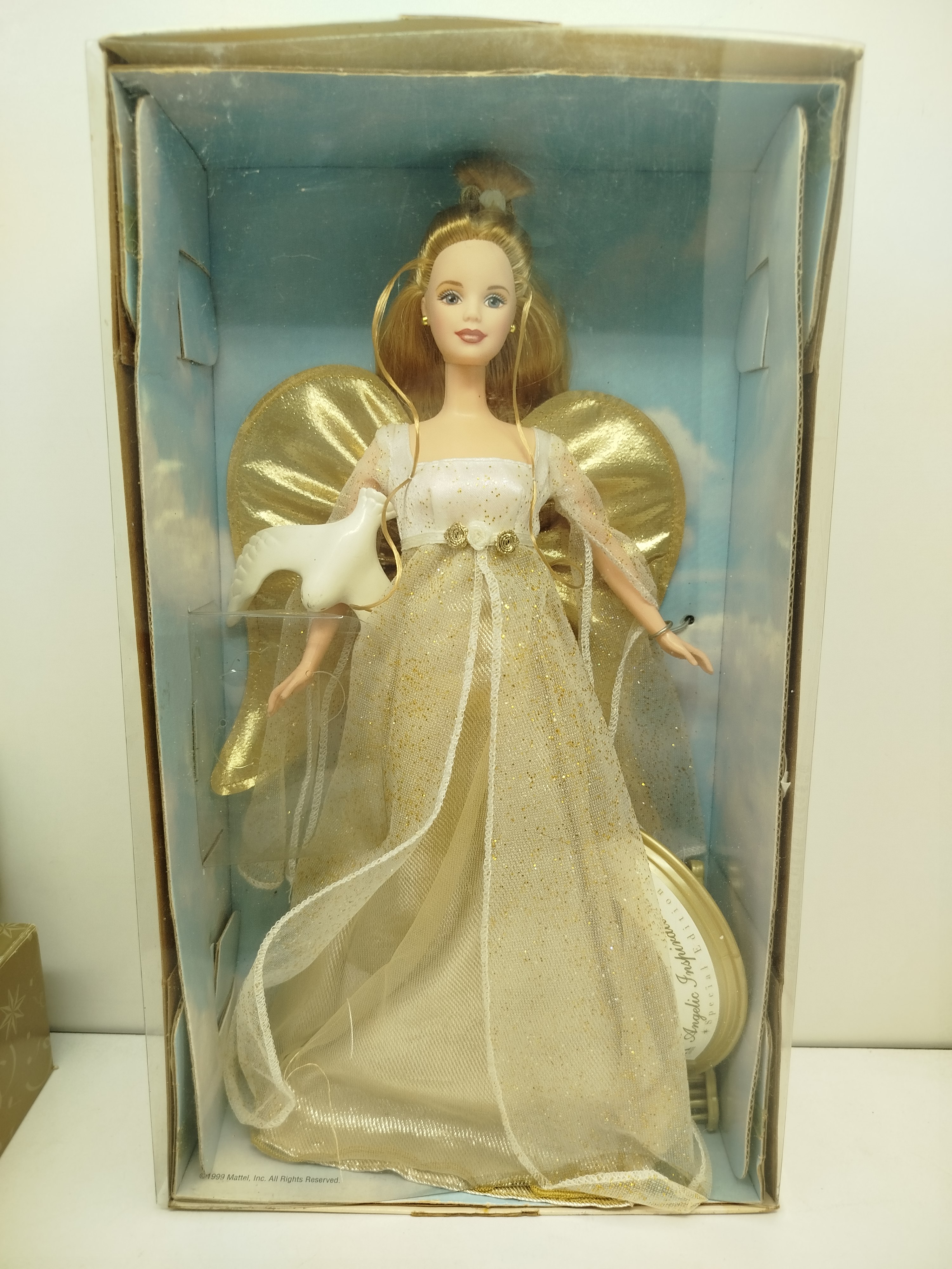 Barbie -   Angelic Inspirations Barbie, una edición especial con temática de ángel lanzada por Mattel en el año 1999