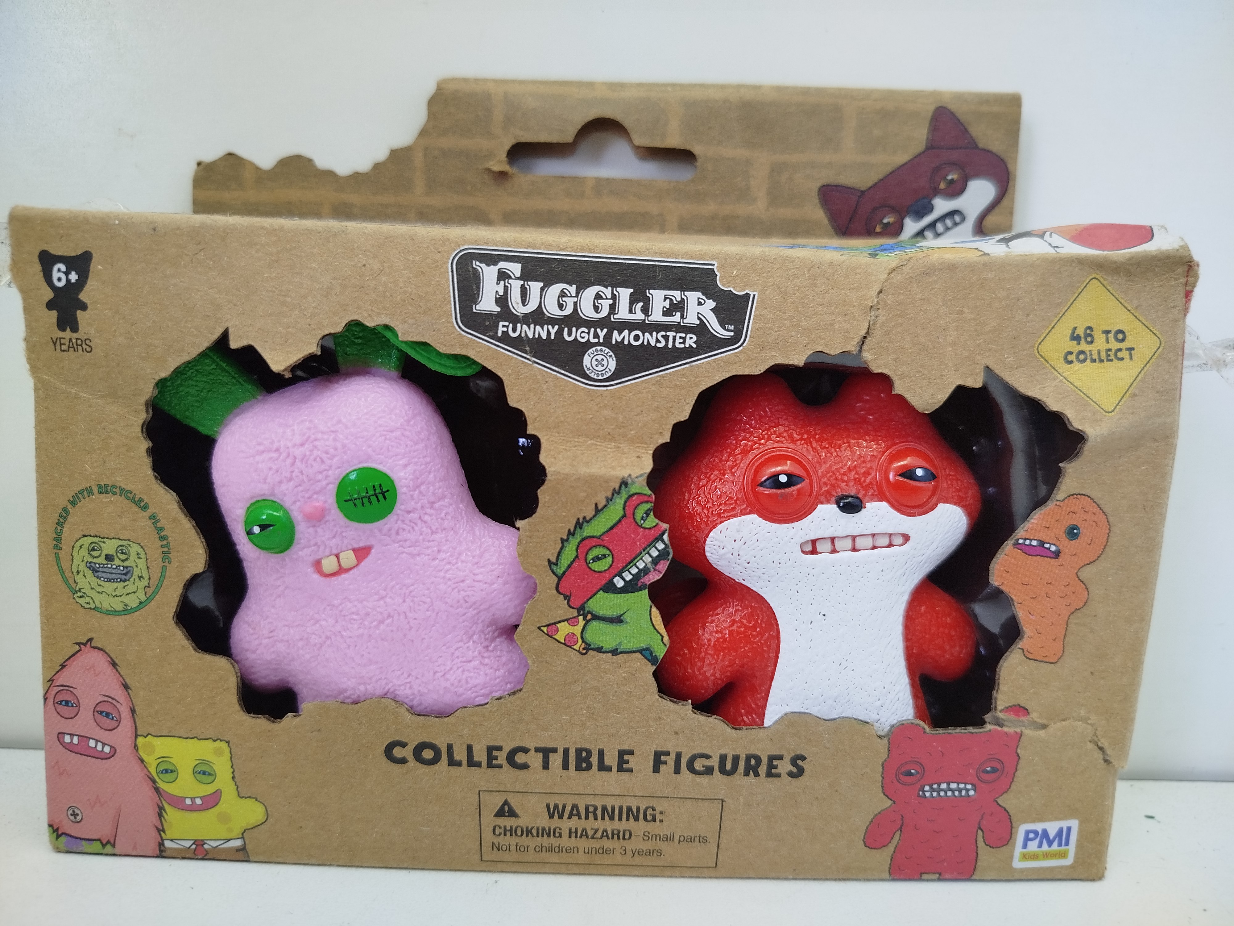 Paquete de 2 figuras de vinilo coleccionables Fuggler (Funny Ugly Monster), fabricado oficialmente por PMI Kids World