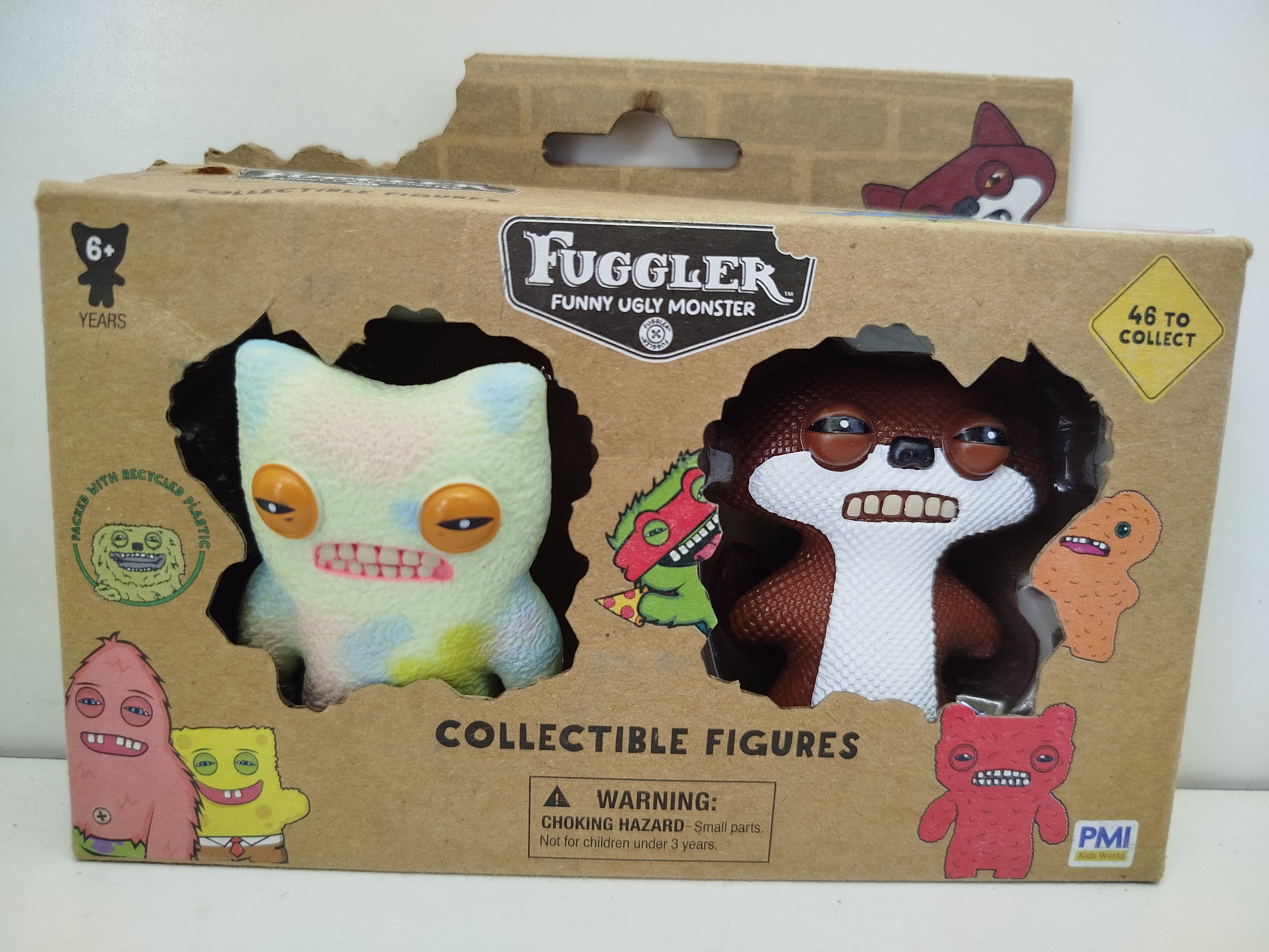 Paquete de 2 figuras de vinilo coleccionables Fuggler (Funny Ugly Monster), fabricado oficialmente por PMI Kids World