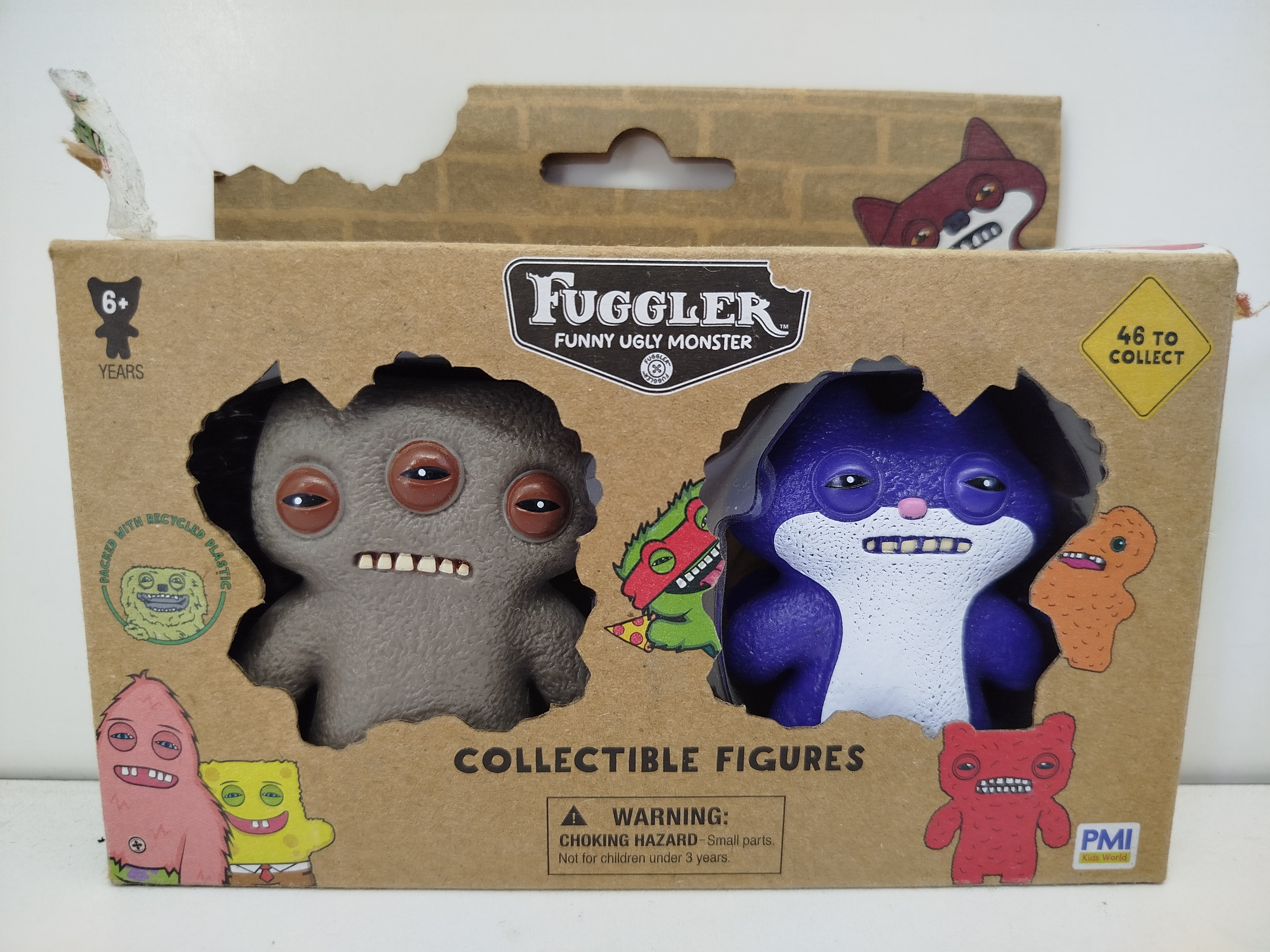 Paquete de 2 figuras de vinilo coleccionables Fuggler (Funny Ugly Monster), fabricado oficialmente por PMI Kids World