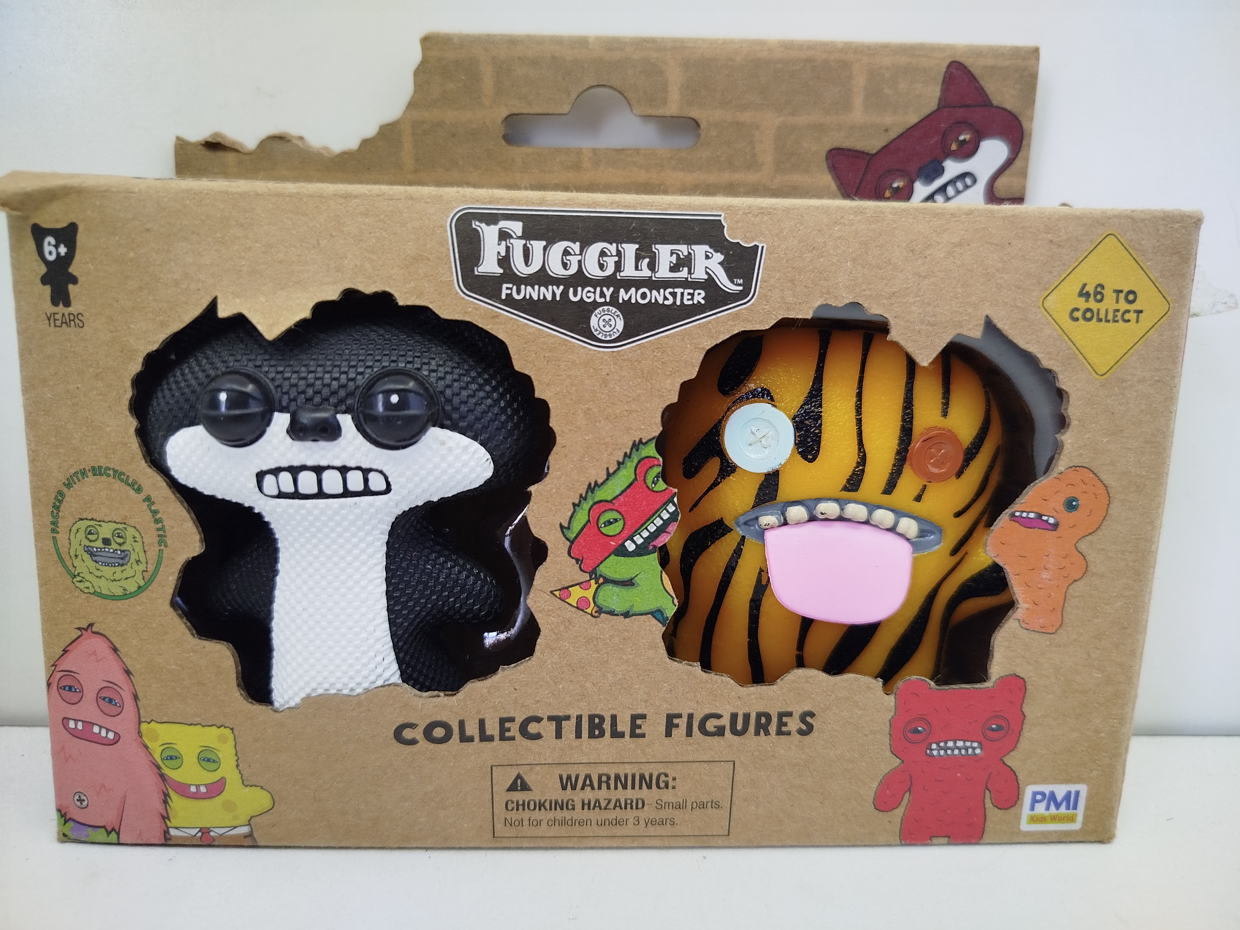 Paquete de 2 figuras de vinilo coleccionables Fuggler (Funny Ugly Monster), fabricado oficialmente por PMI Kids World