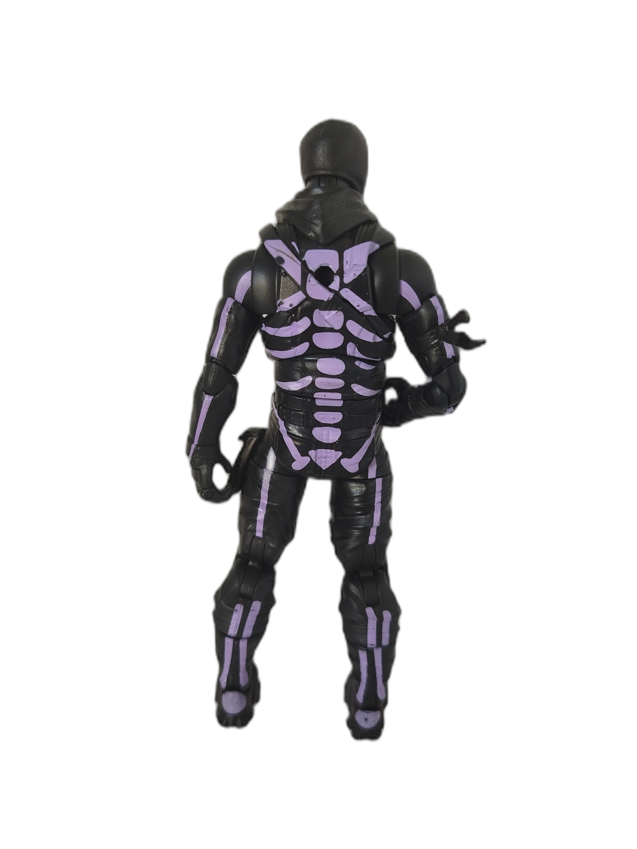 Skull Trooper (Soldado Calavera), pero en su variante más exclusiva y cotizada: la versión Purple Glow (Resplandor Morado)