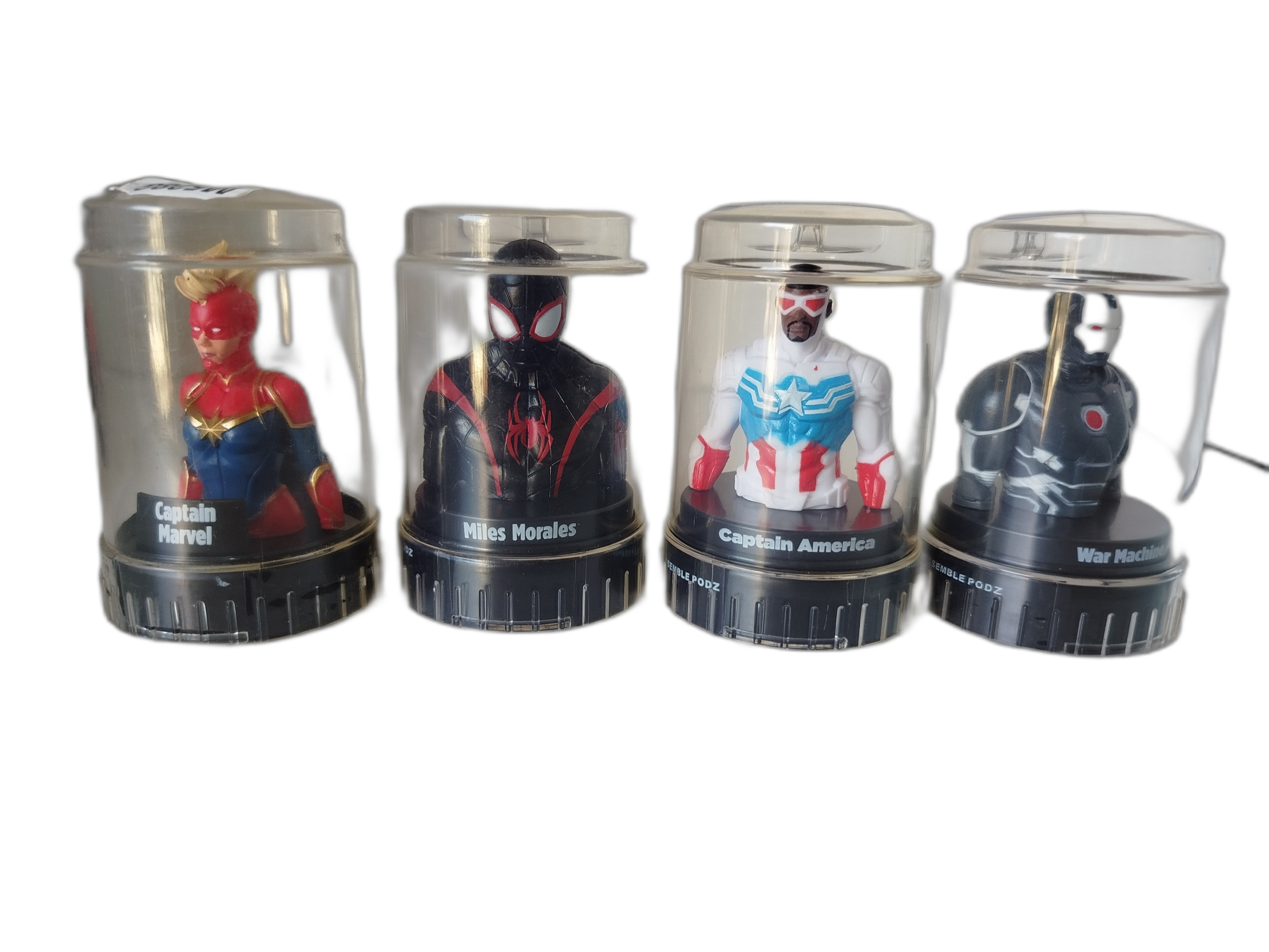 4 PODZ - Superheroes - Cápsulas  transparentes con base negra